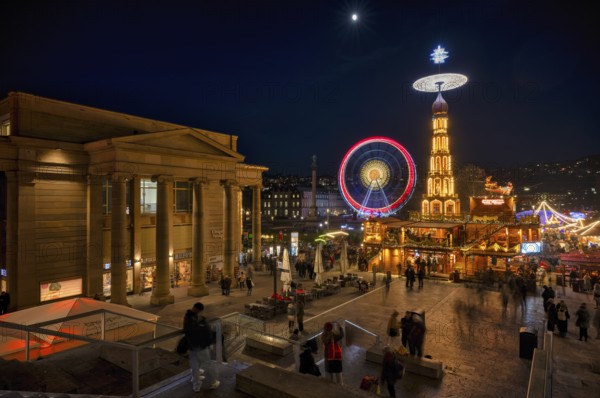 Night view, Christmas market with Christmas pyramid, Ferris wheel, New Palace, Schlossplatz,