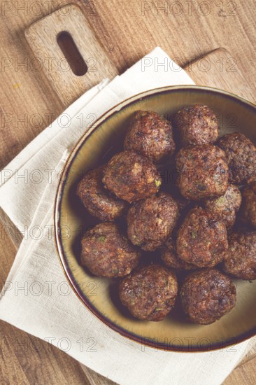 Fried meatballs in a frying pan, homemade, no people