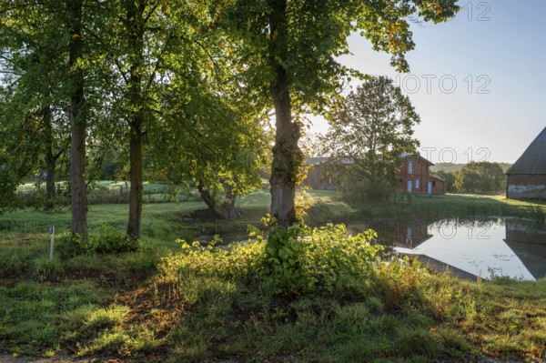 Manor with historic stables and pond, from 1923, Gut Othenstorf, Mecklenburg-Western Pomerania,