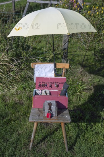 Jewellery offering under an umbrella by the wayside, Ahrenshoop, DarÃŸ, Mecklenburg-Western
