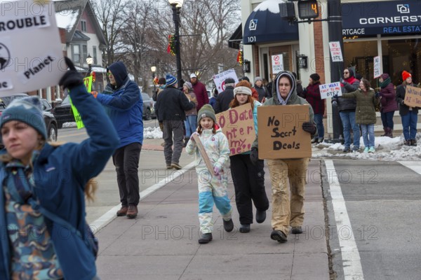 Saline, Michigan USA - 1 December 2025 - Rural Michigan residents rally against the $7 billion