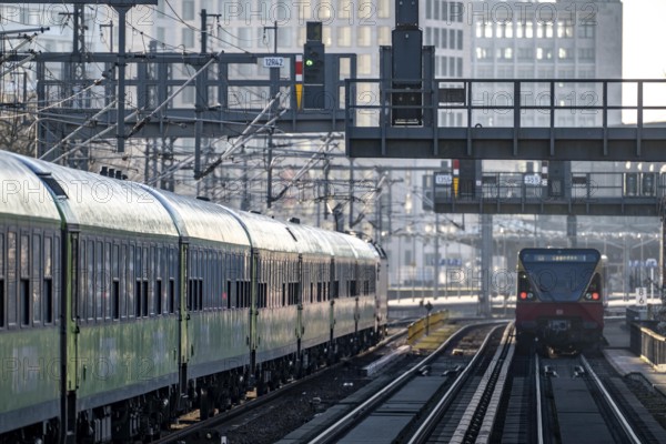S-Bahn train and Flixtrain train on the route, near Tiergarten station, Berlin, Germany