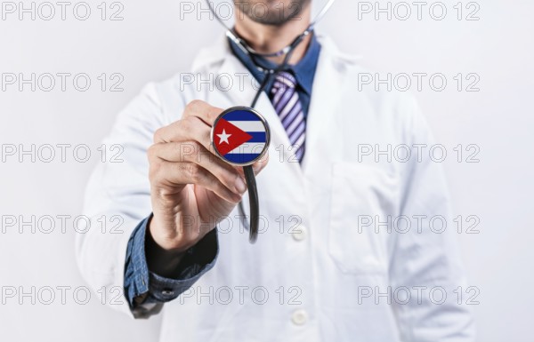 Cuba healthcare system, doctor holding stethoscope. Cuba health and medical insurance concept