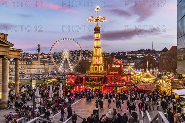 Sunset at Stuttgart's Christmas market in the Schlossplatz area. With around 3.5 million visitors,