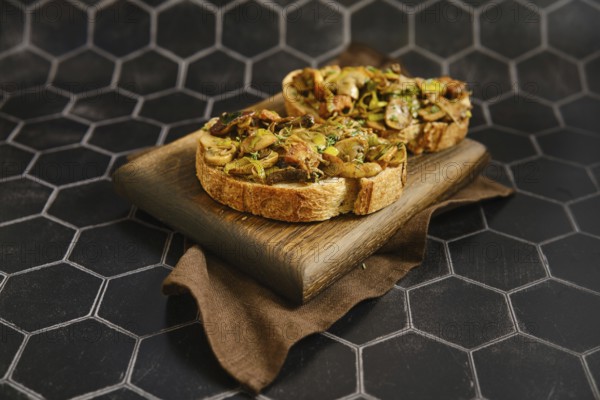 Freshly made mushroom sandwich features honey mushroom, enoki mushroom, champignon, and leek on