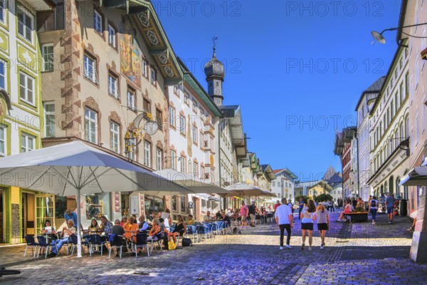 Historic market street with street cafe and typical gabled houses, Bad Tölz. Isartal, Upper