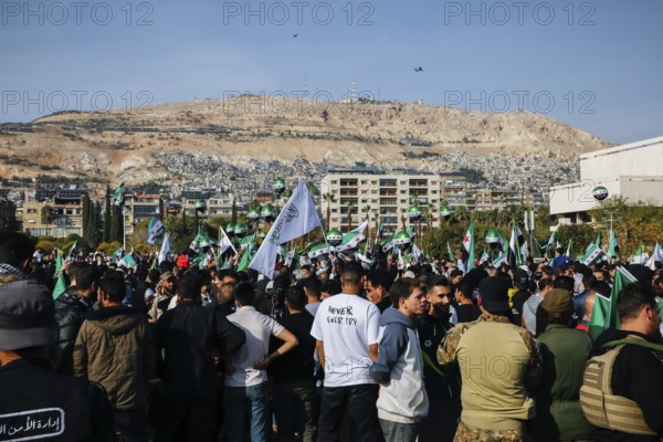 Damascus, Syria. November 28, 2025: Thousands of Syrians gather in Umayyad Square in central