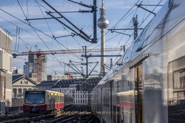 Railway line in Berlin, east of FriedrichstraÃŸe station, looking east, Berlin TV Tower, trains on
