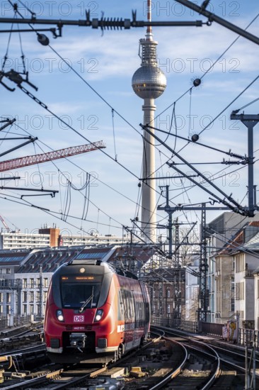 Railway line in Berlin, east of FriedrichstraÃŸe station, looking east, Berlin TV Tower, train on