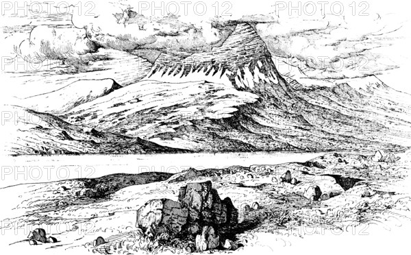 Dormant volcano SkarÃ°sheiÃ°i (1054 m) in the west of the Atlantic island, Hafnarfjalls mountain