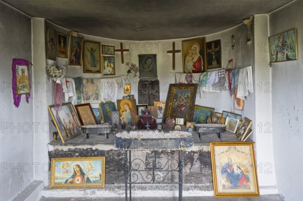 Interior view of an altar with religious icons and decorations on the walls, Holy Cross Chapel,