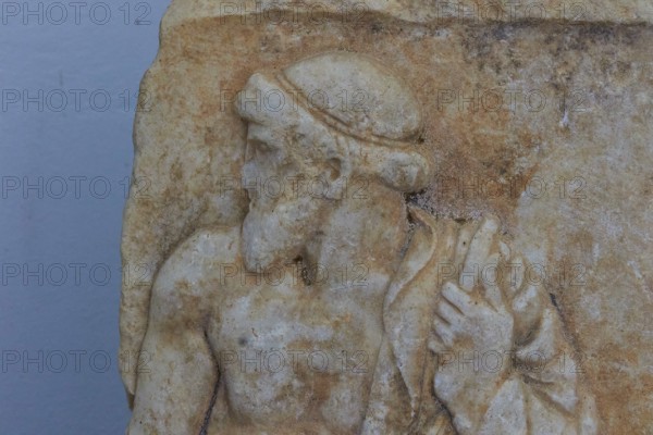 Marble relief depicting standing man, c. 460 BC, ancient stone relief with bearded man in