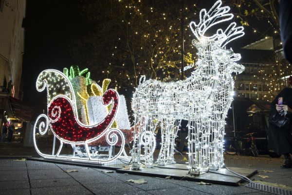 A light installation in front of the Christmas lights on KurfÃ¼rstendamm on 25.11.2025. The
