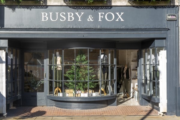 Shopfront window display Busby & Fox shop store, Cathedral Yard, Exeter city centre, Devon,