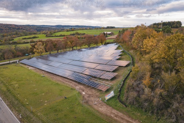 Solar system in autumn landscape with a view of the horizon, PV Freifaechenanlage construction,