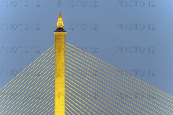 The illuminated Rama VIII Bridge, a cable-stayed bridge across Mae Nam Chao Praya, Bangkok,
