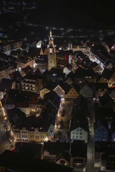 Illuminated city view at night with a church tower in the middle, Nagold, Calw district, Germany