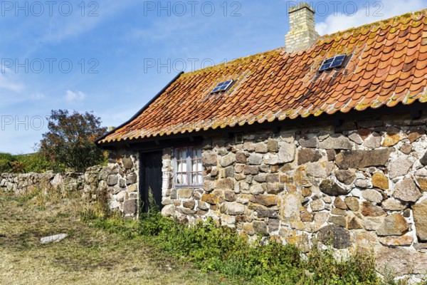 Traditional stone house, red tile roof, FrederiksÃ¸, Frederiksö, Ertholmene, Pea Islands, Bornholm,