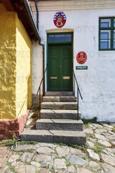 Stairway, police station entrance, sign with the words Police, ChristiansÃ¸, Christiansö,
