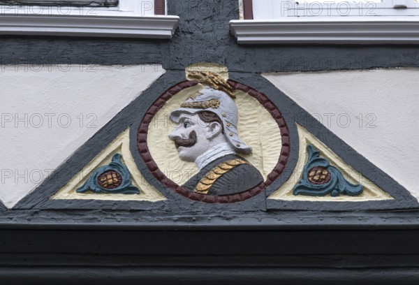 Decoration on half-timbered house, BarfÃ¼sserstraÃŸe, Marburg, Hesse, Germany