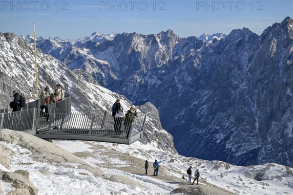 Tourists on a viewing platform on Zugspitzplatt, Grainau municipality, Garmisch-Partenkirchen