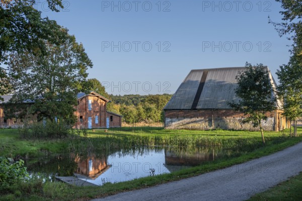 Historic buildings, pig and poultry house and pond of a manor from 1923, Othesdorf,