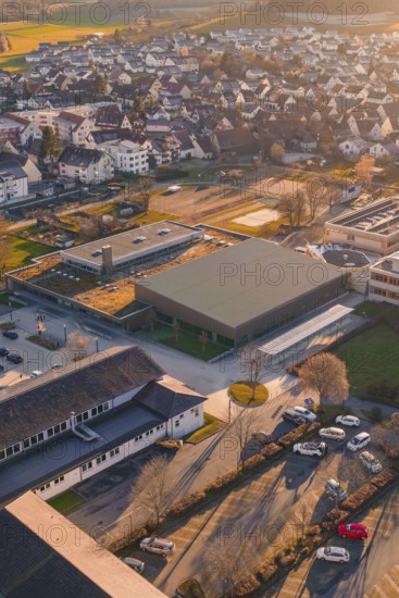 Aerial view of a village at sunset with a view of buildings and autumn colors, Althengstett sports