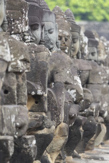 54 demons on the bridge at the south gate of Angkor Thom (Hindu myth of the Cherry of the Milk