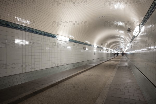 Interior view, pedestrians crossing tunnel, mopping effect, tube, historic old Elbe Tunnel, Free