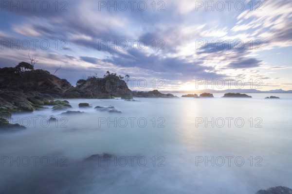 Sunset at Fisherman's Lookout. Dramatic waves and coastal scenery at The Pass, New South Wales,