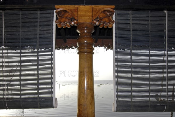 Close-up view of bamboo blinds and artfully turned wooden post, Heritage Hotel Privacy, Vembanad