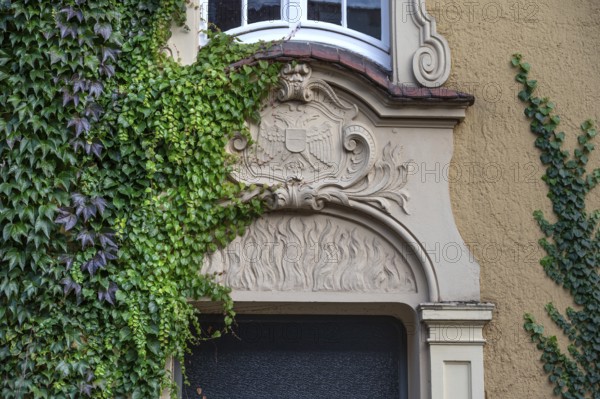 Stucco decoration above the entrance to Johanneum, built in 1905, near St. Johannis 1-3, Hanseatic