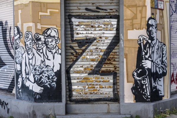 Street art in Essen, graffiti on an empty building on VarnhorststraÃŸe, city center, North