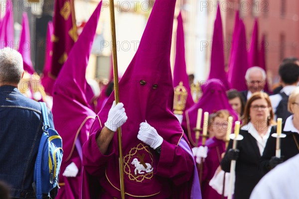 Good Friday procession, religious procession with participants in purple robes, UNESCO World