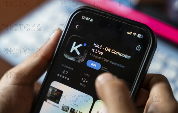 In this photo illustration, a person uses the Kimi AI chatbot on a smartphone, in New Delhi, India