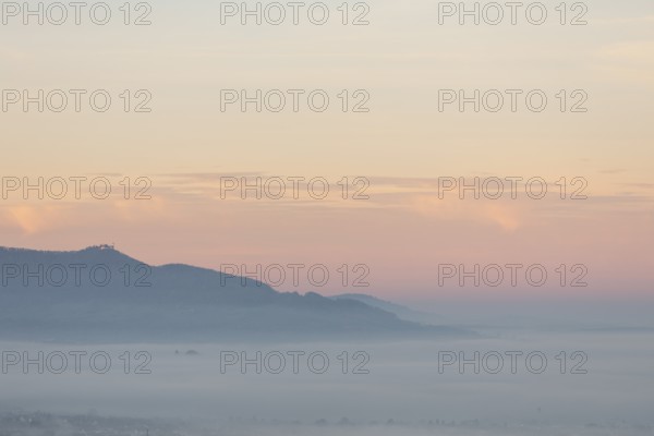 The majestic Teck Castle towers over the fog in the foothills of Alb. Aichelberg View of Teck