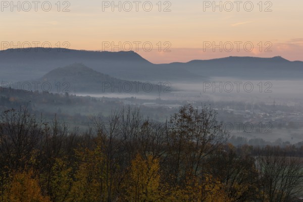 The majestic Teck Castle towers over the fog in the foothills of Alb. Aichelberg View of Teck