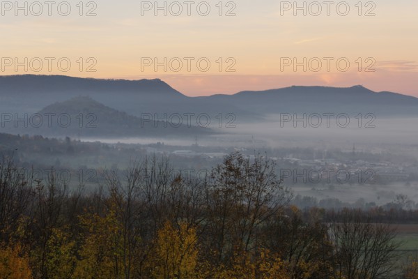 The majestic Teck Castle towers over the fog in the foothills of Alb. Aichelberg View of Teck
