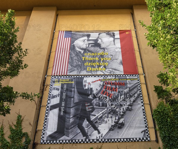 Film posters at the cult cinema Babylon on Rosa Luxemburg Platz, arthouse cinema opened in 1929,