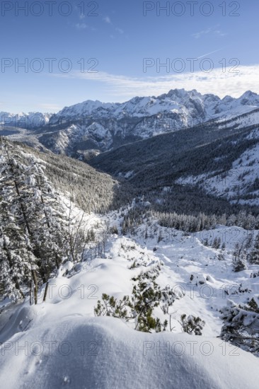 View over snow-covered side valley towards Reintal, snowy mountain landscape, ascent to