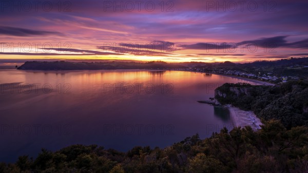 Landscape with sea and sandy beach in New Zealand. View of Lonely Bay and Cooks Beach from
