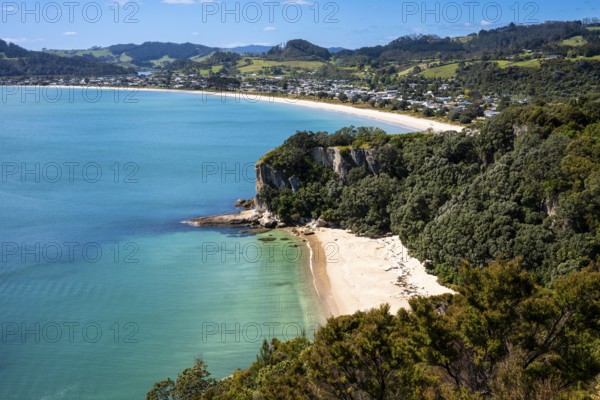 Landscape with sea and sandy beach in New Zealand. View of Lonely Bay and Cooks Beach from