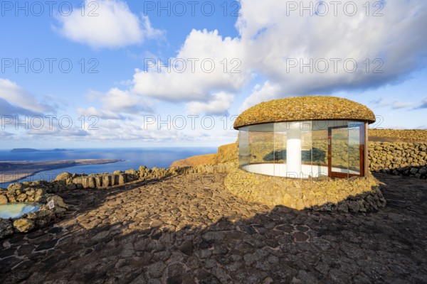 Staircase and viewing platform at the Mirador del RÃ­o viewpoint, in the evening light with sun