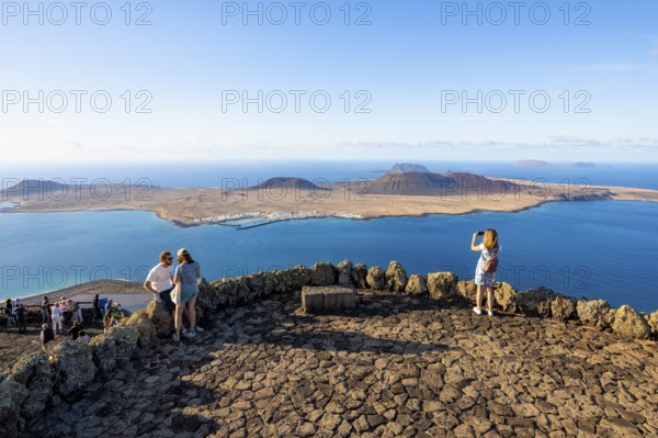 Tourists on the viewing platform at the Mirador del RÃ­o viewpoint, in the evening light, view of