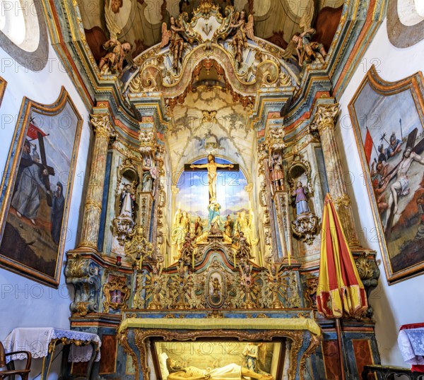 Interior of the historic baroque church of Bom Jesus de Matosinhos with the crucified Jesus and