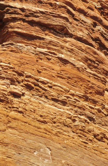 Close-up of red and orange rock layers of a rock formation, rock, slope rocks, red cliffs with
