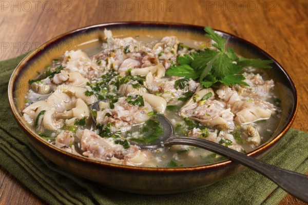 Muzhuzhi, a Georgian dish made from pork legs, with spices and herbs, homemade