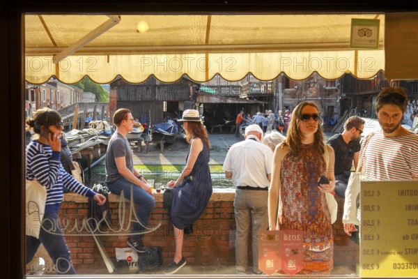 BÃ caria Al Squero, a small bar where you drink wine or spritz and eat the cicchetti Veneziani,