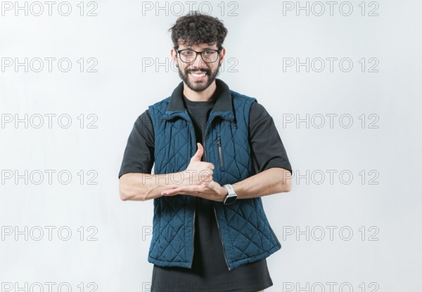 Person gesturing help with hands in nonverbal language. Smiling man showing help gesture with hands