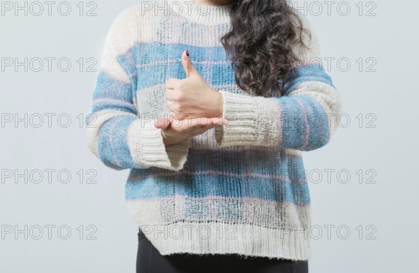 Close up of hands gesturing help in nonverbal language. Hands showing HELP gesture with hands in